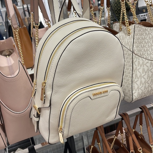Michael Kors Jaycee Medium Pebbled Leather Backpack
Light Cream - Picture 15 of 16